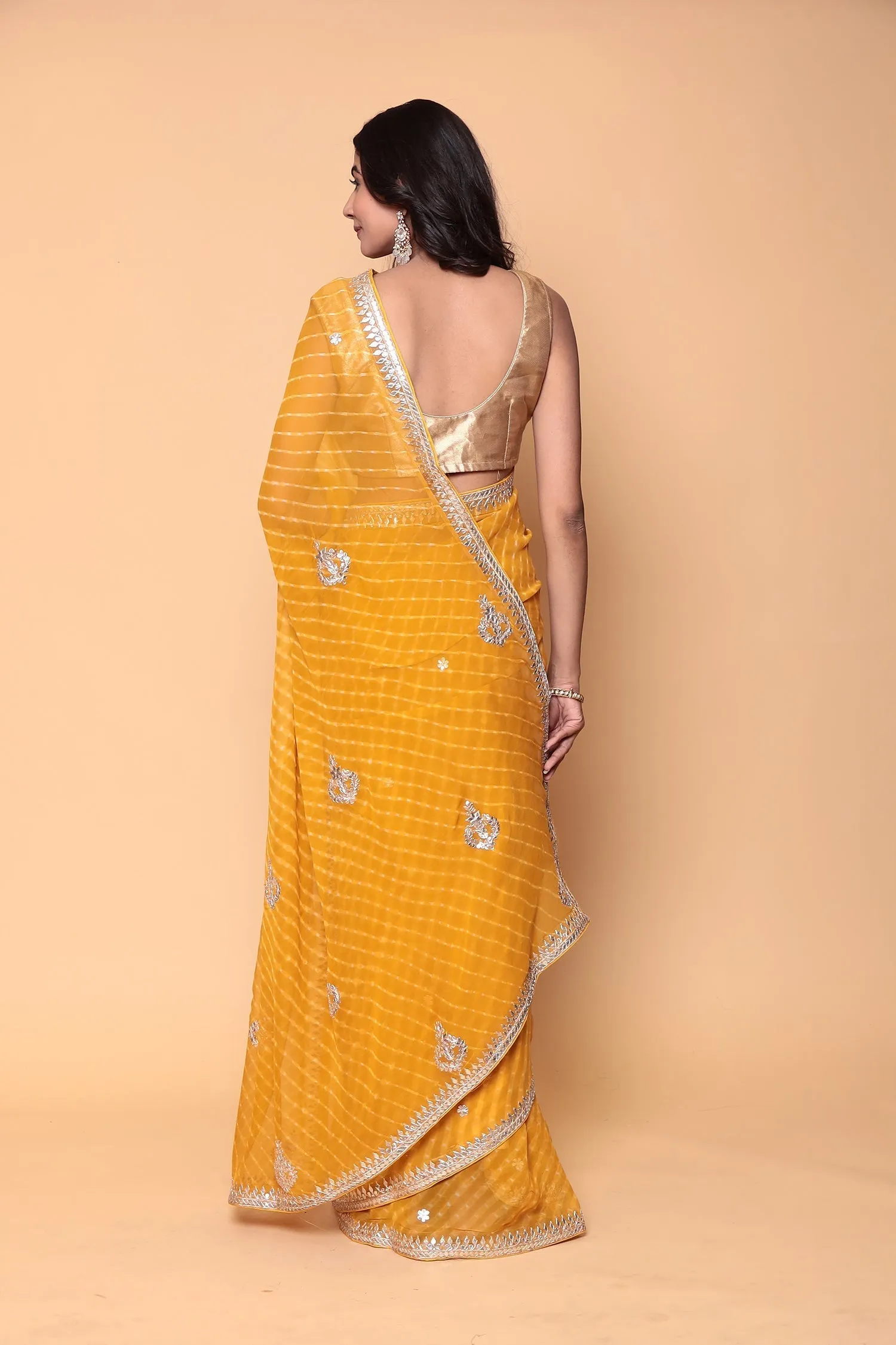 Chiffon Saree with Gota Patti, Mothra work.