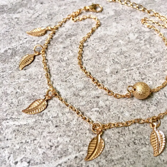 GOLD MULTI LAYER BOHO ANKLET / ANKLE BRACELET WITH LEAF AND BALL DESIGN