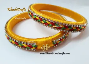 Yellow designer Silk thread Bangles with plait work